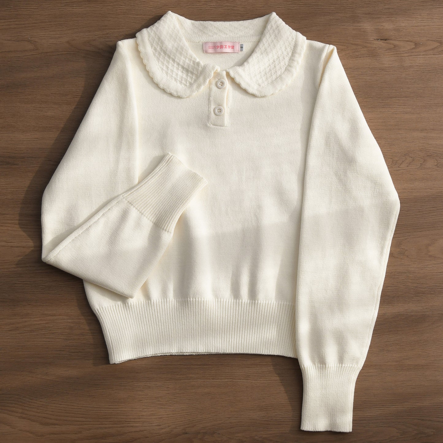 Strickoberteil mit Rundkragen und 2 Knöpfen [MIST]