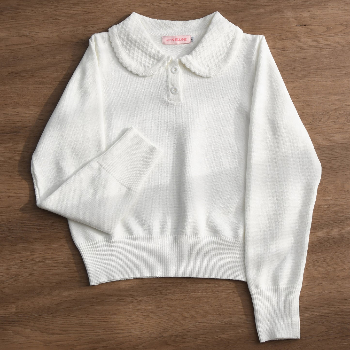 Strickoberteil mit Rundkragen und 2 Knöpfen [MIST]